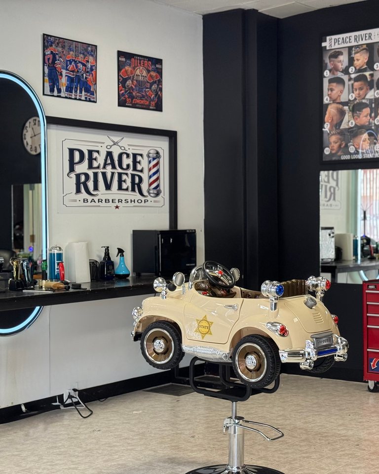 The gold kids car chair in front of an arched shop mirror