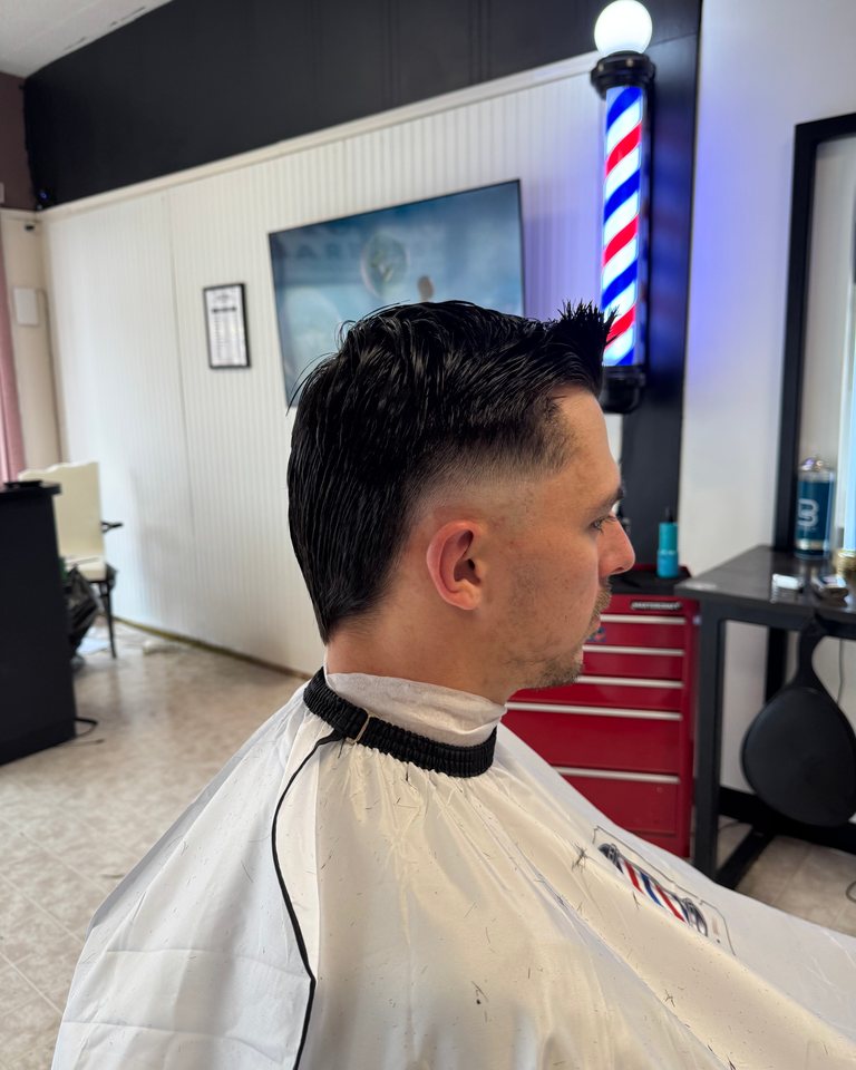 Short haircut with a clean tapered side
