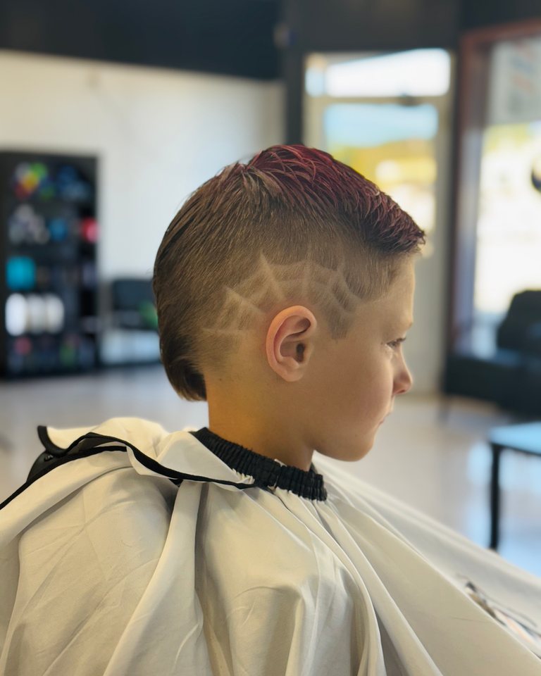 Kids haircut with a shaved line design