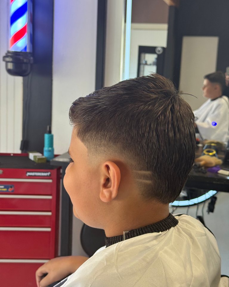 Close side view of a finished short haircut