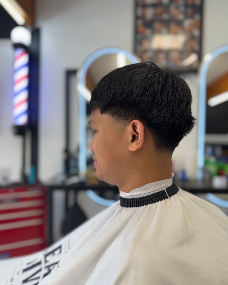 Straight fringe and neatly tapered sides