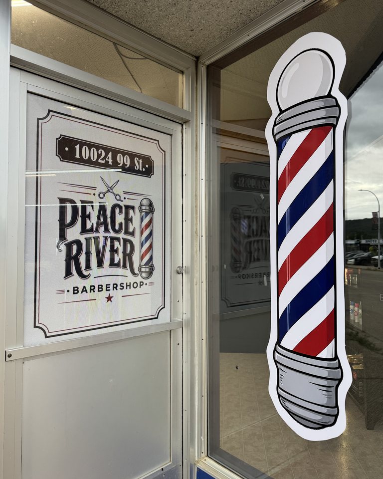 Barber pole and Peace River sign inside the entrance