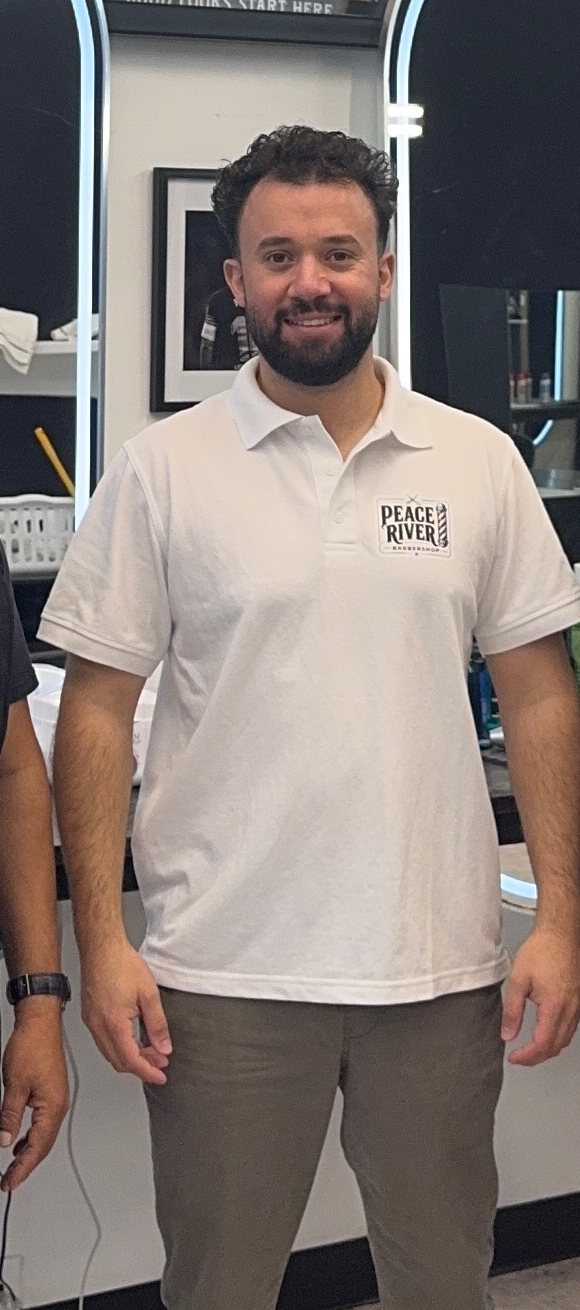 A member of our team of barbers at Peace River Barbershop