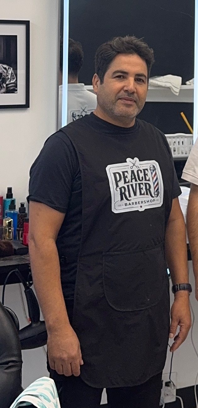 A member of our team of barbers at Peace River Barbershop