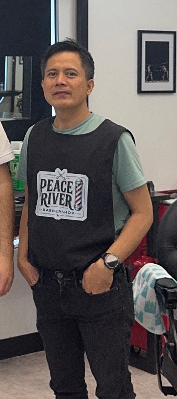A member of our team of barbers at Peace River Barbershop